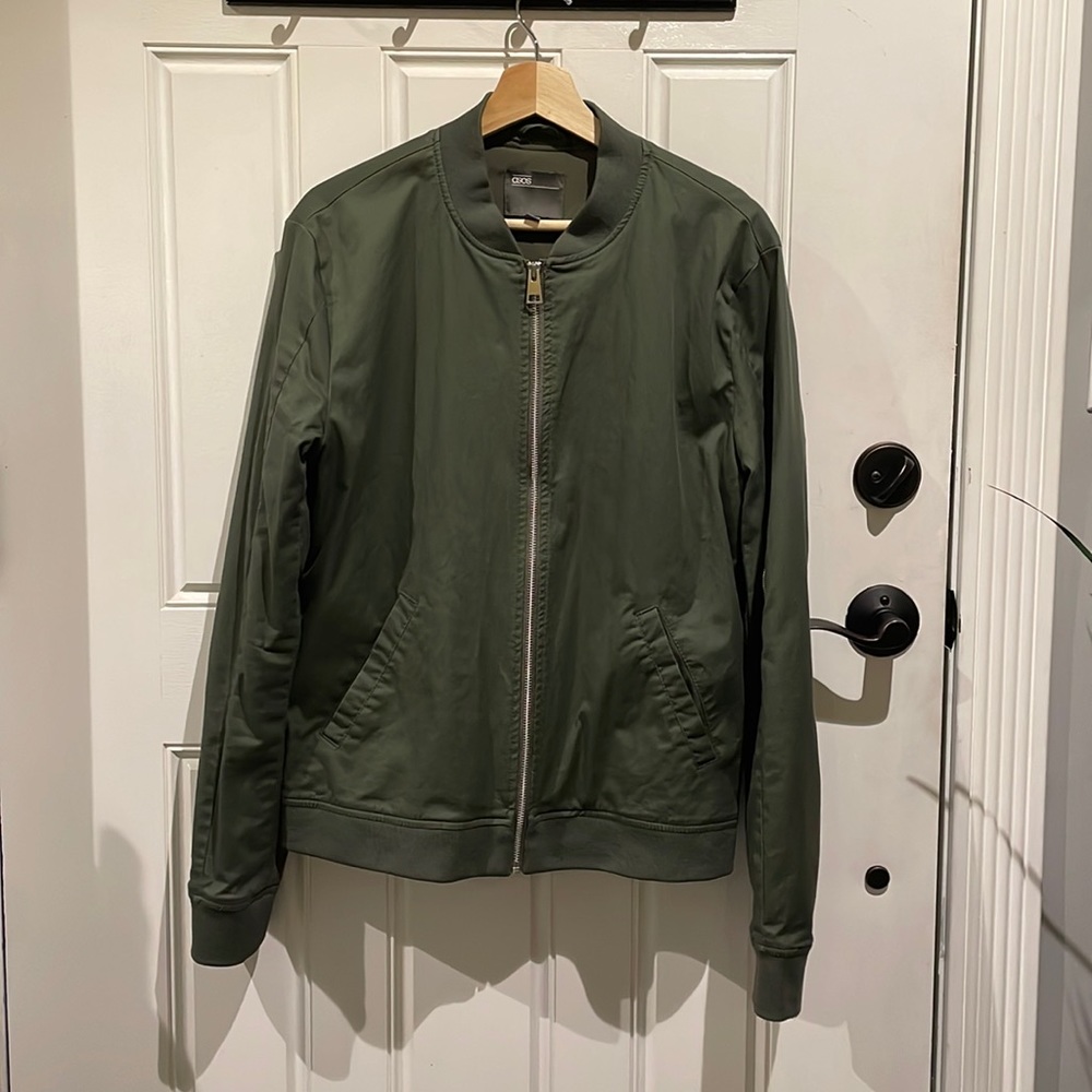 Selling a green asos large jacket. Like new condition.